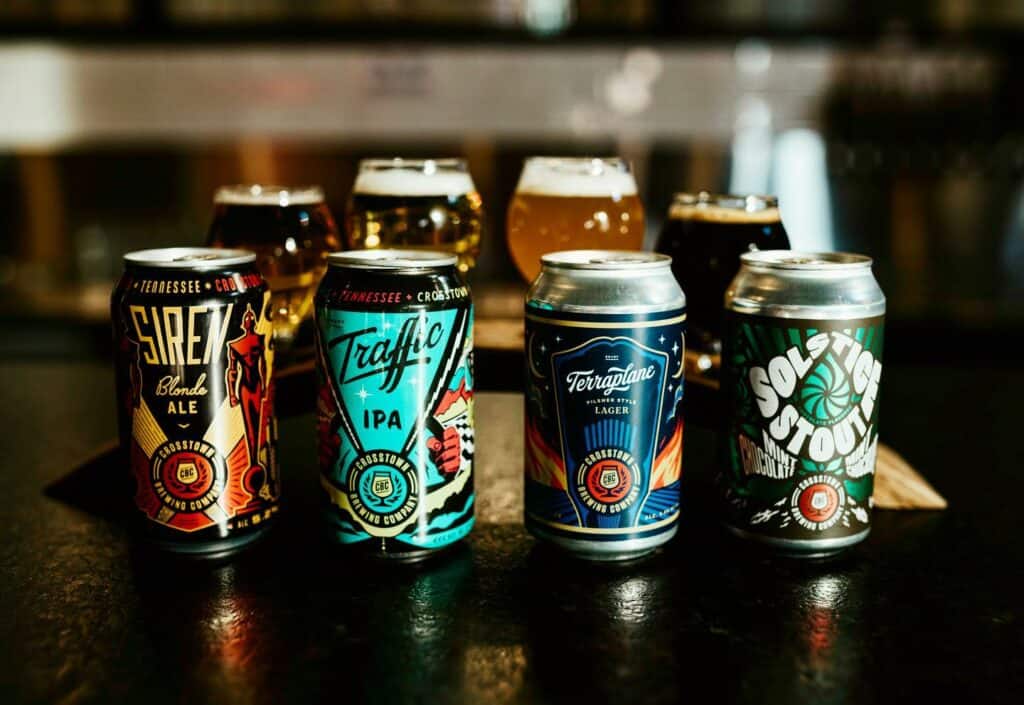 Crosstown Brewing Company's beer cans designed by Tom Martin.