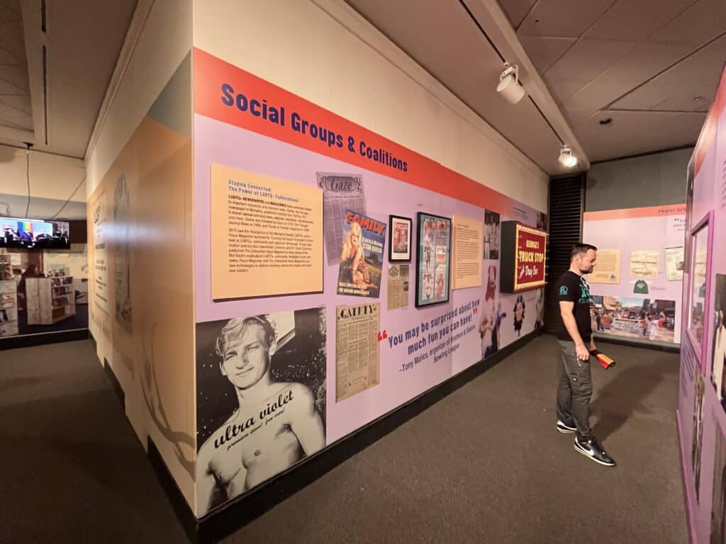 Visitors examine the exhibit at the museum.