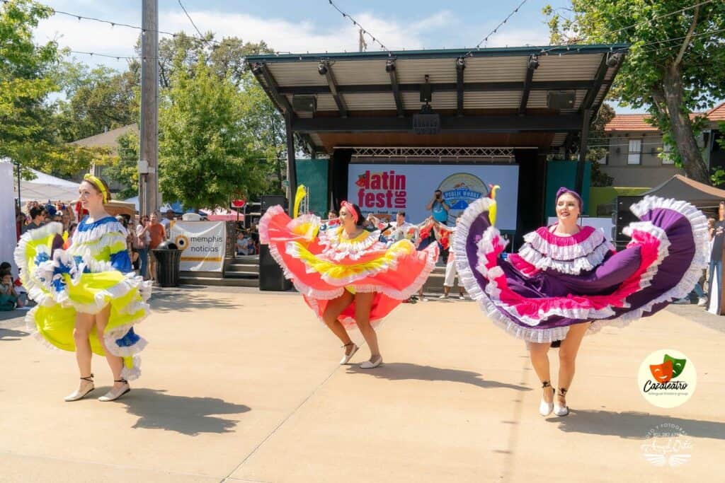 Colorful dancers perform at Overton Square at a past Latin Day 901 event.